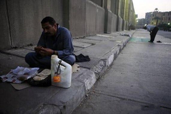 Praying on Sidewalk