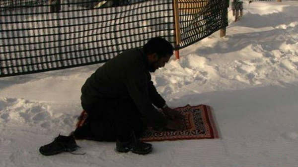 Muslim Prayer in Snow